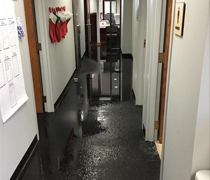 hallway flooded from broken pipe